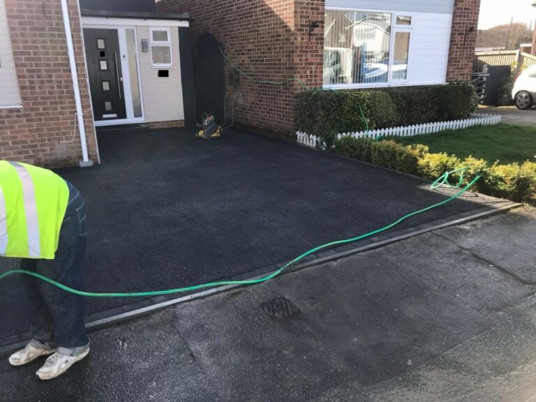 Tarmac Driveway with a New Step in Hythe, Kent
