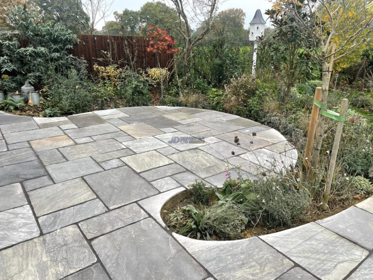 Raised Indian Sandstone Patio With Brick Wall And Steps In Ashford, Kent (7)