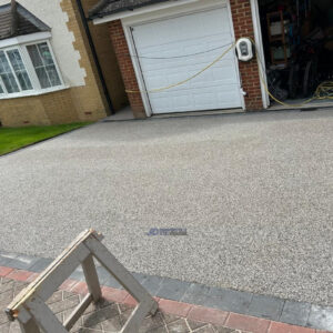 Resin Bound Driveway with Brick Border and Sleeper Wall in…