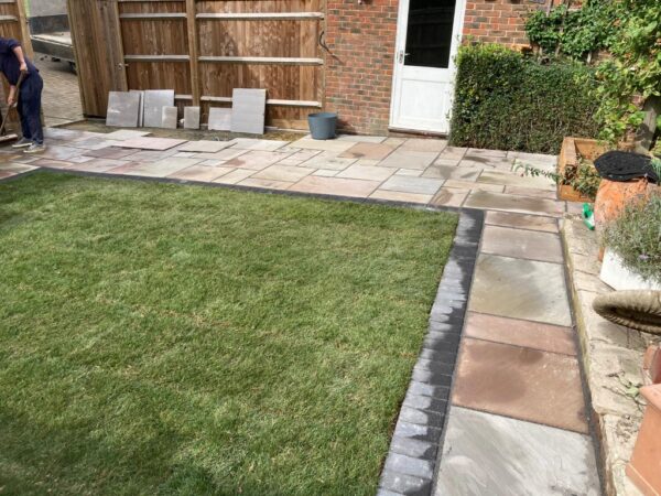 Indian Sandstone Patio With Artificial Grass And Sleepers In Kings Hill 6.jpeg