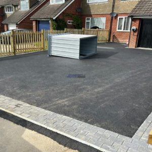 Tarmac Driveway with Block Paved Border and Picket Fence in…