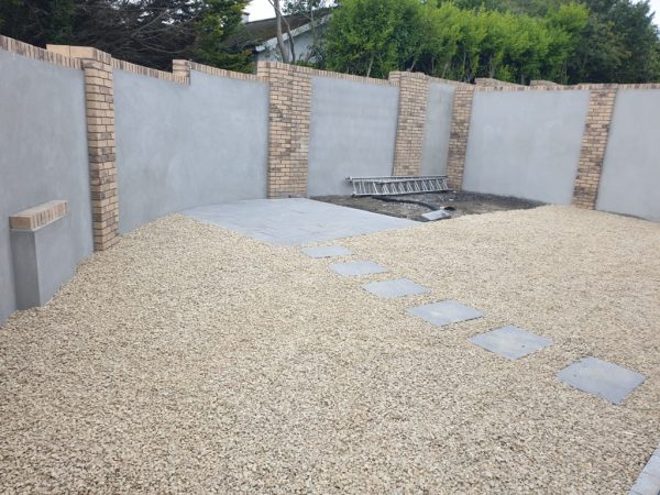 Gravel being laid on a driveway in Acrise Place