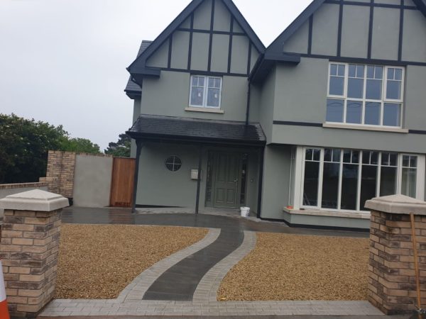 Gravel being laid on a driveway in Arpinge