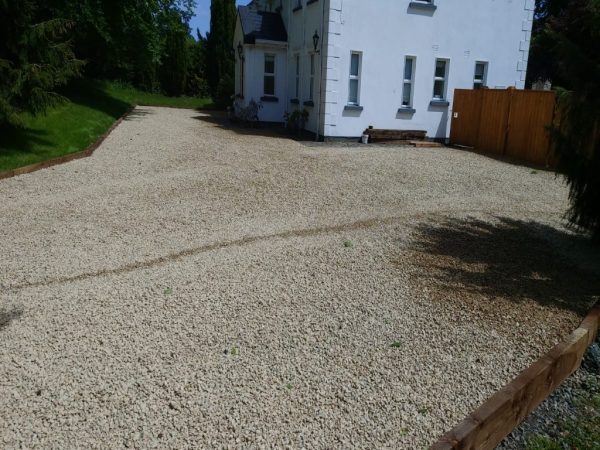 Gravel being laid on a driveway in Benenden