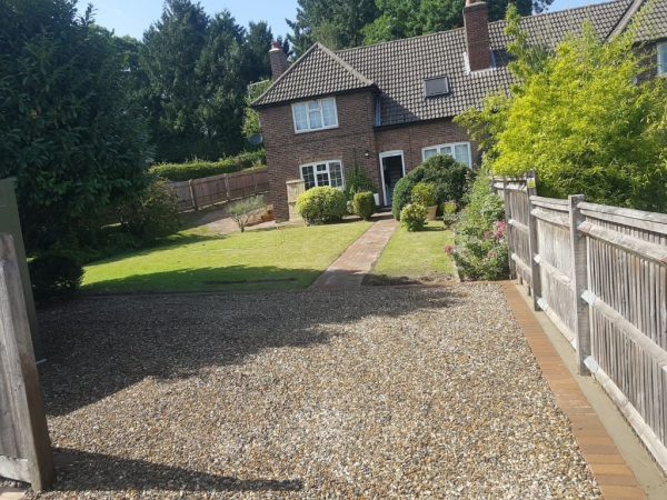 Gravel being laid on a driveway in Bilsington