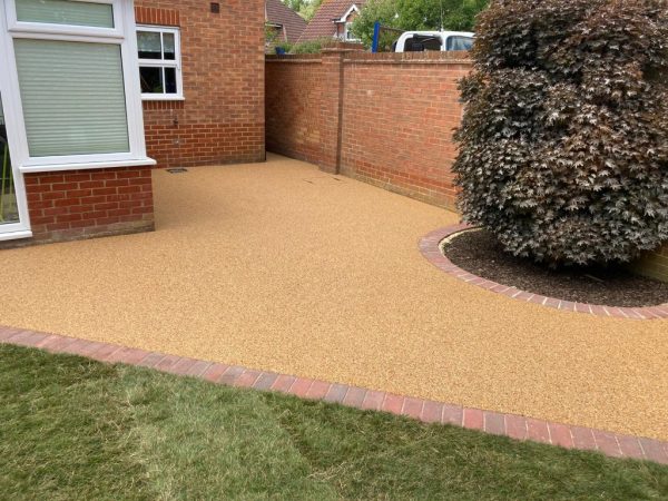 Resin patio installation in Five Oak Green